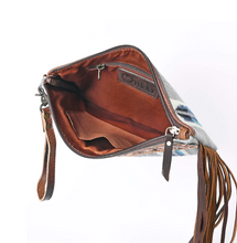 Western Wristlet with leather tooling.